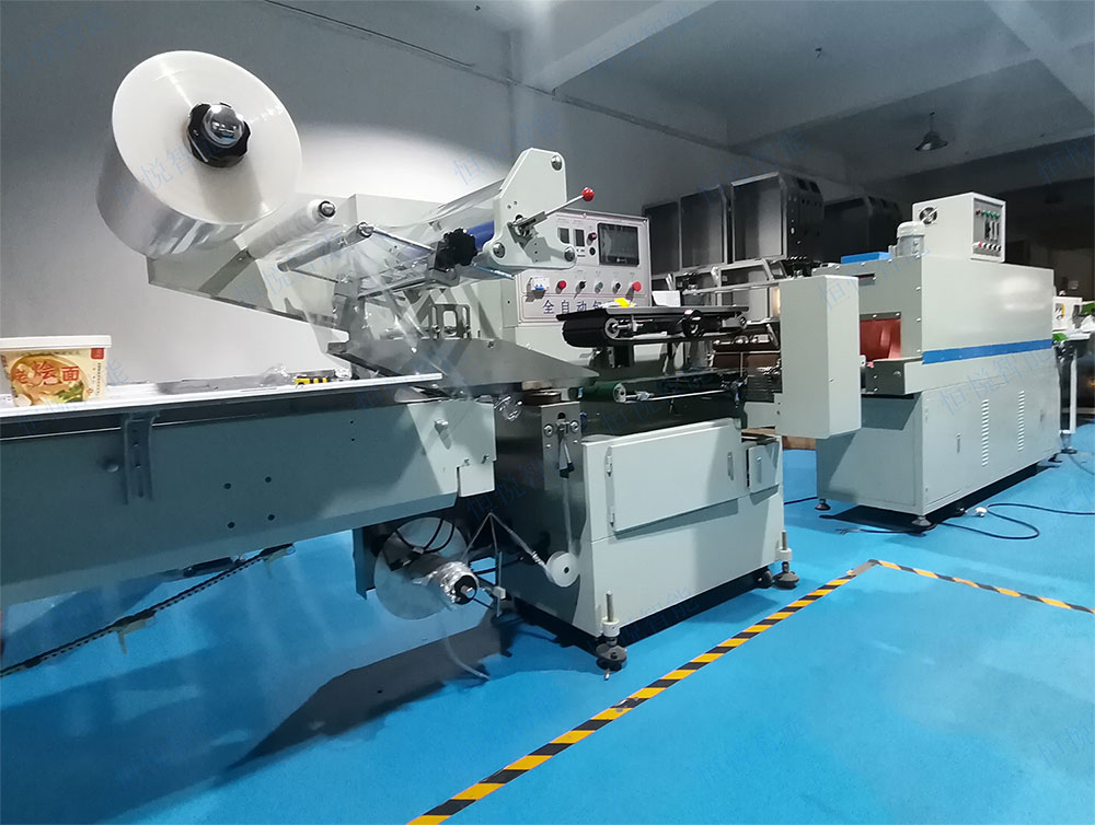 桶裝面熱收縮包裝機.jpg 桶裝面熱收縮包裝機.jpg