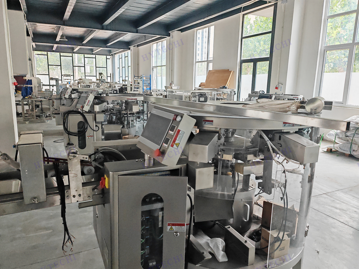 八工位旋轉(zhuǎn)給袋式自動(dòng)包裝機(jī) 八工位旋轉(zhuǎn)給袋式自動(dòng)包裝機(jī)